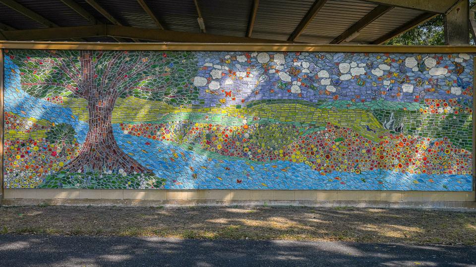 The mural of tiles made by members of the Uvalde community is displayed at Jardin de los Heroes Park. Artist Wanda Montemayor led a dedication and celebration Saturday