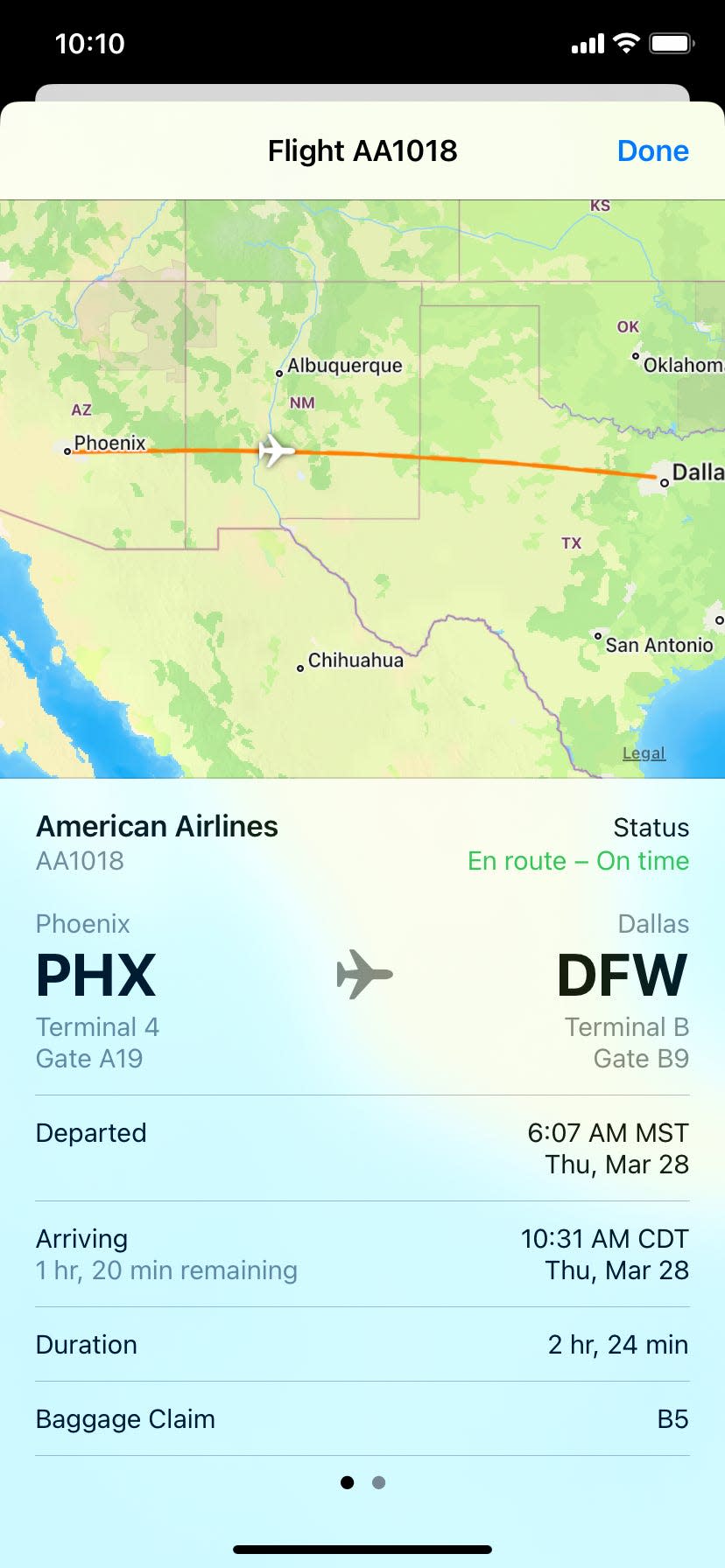 A screenshot of information about a flight from Phoenix to Dallas, including status, departure and arrival terminals and gates, flight duration, and baggage claim.