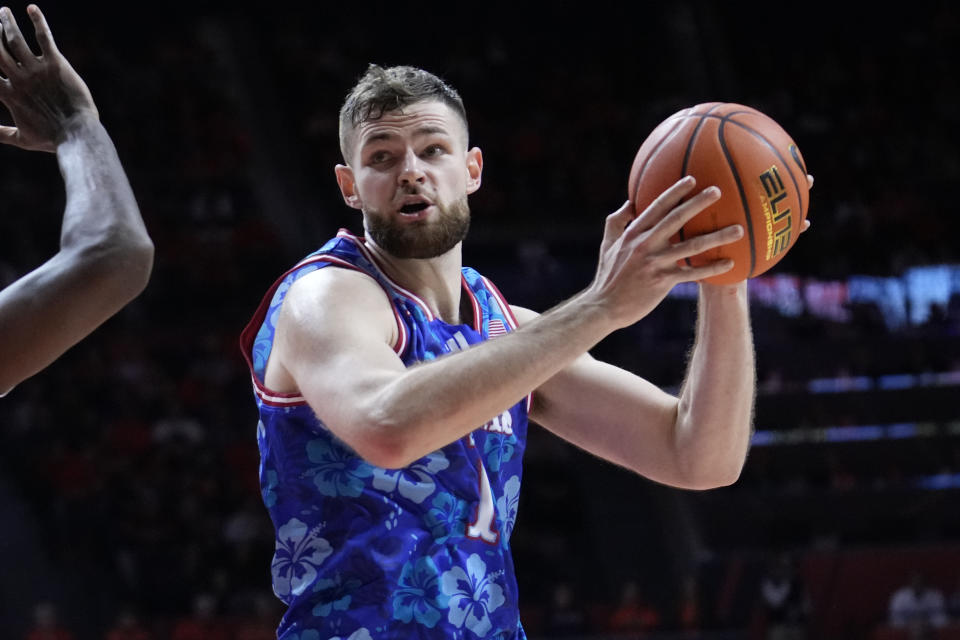 Kansas center Hunter Dickinson is expected to be one of the most impactful transfers this season. (AP Photo/Charles Rex Arbogast)