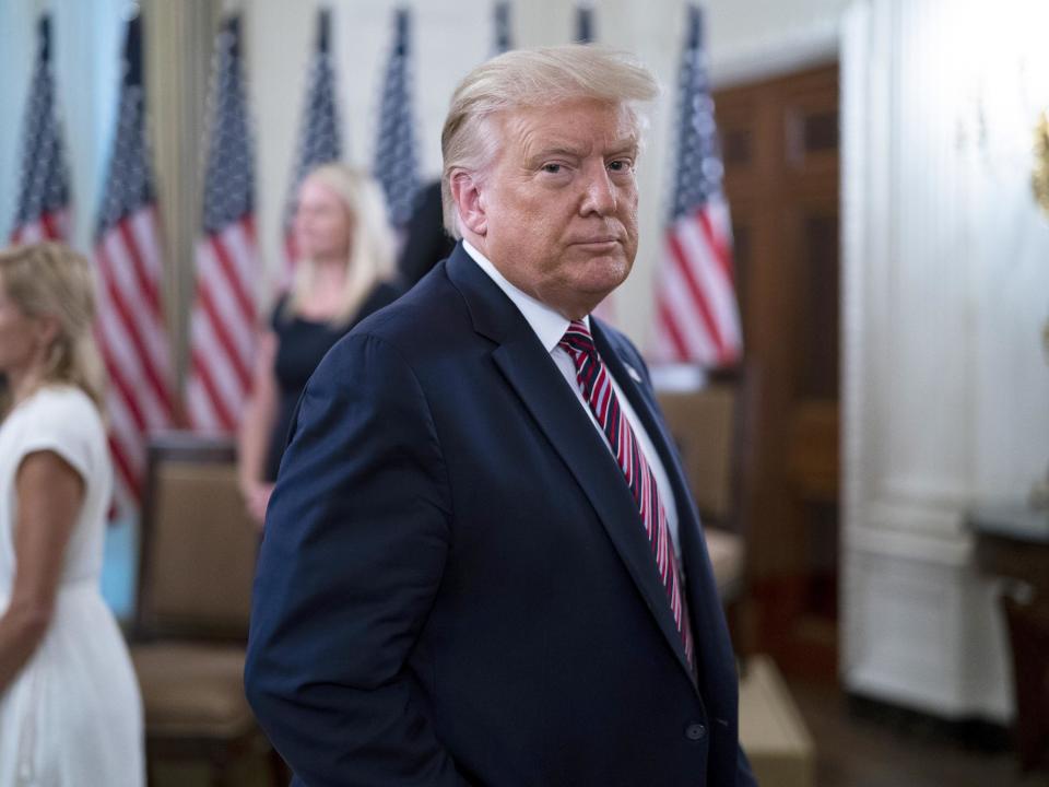 US president Donald Trump departs an event titled "Kids First: Getting America's Children Safely Back to School" 12 August 2020 in the State Dining Room at the White House in Washington, DC: (2020 Getty Images)