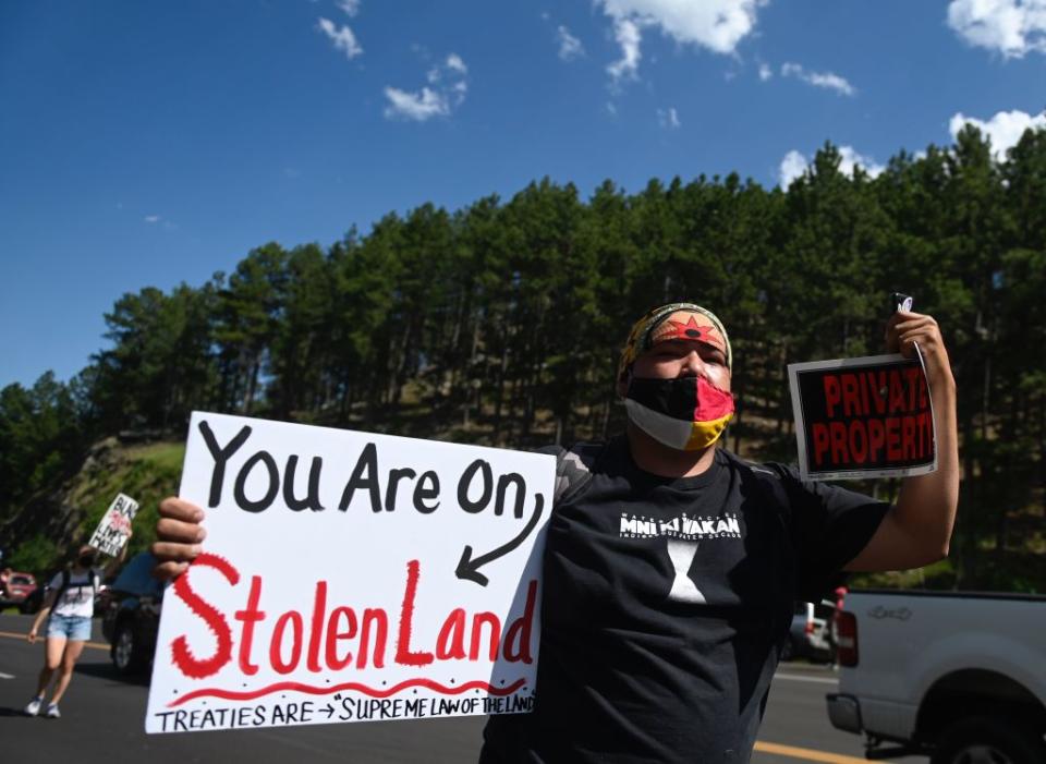 Activists and members of different tribes from the region protest in Keystone, South Dakota, on July 3, 2020, during a demonstration around the Mount Rushmore National Monument and the visit of then-President Donald Trump. (Andrew Caballero-Reynolds Getty Images)