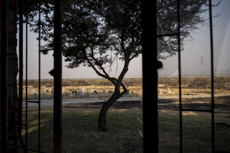 The cemetery where where the body of 12-year-old Onthatile Mohapi is buried in Damonsville, South Africa, is seen in this June 8, 2020 photo. Mohapi's body was found in a dam 7 kilometers from his home. The pathology report said the boy drowned, but his mother believes he was murdered. (AP Photo/Bram Janssen)