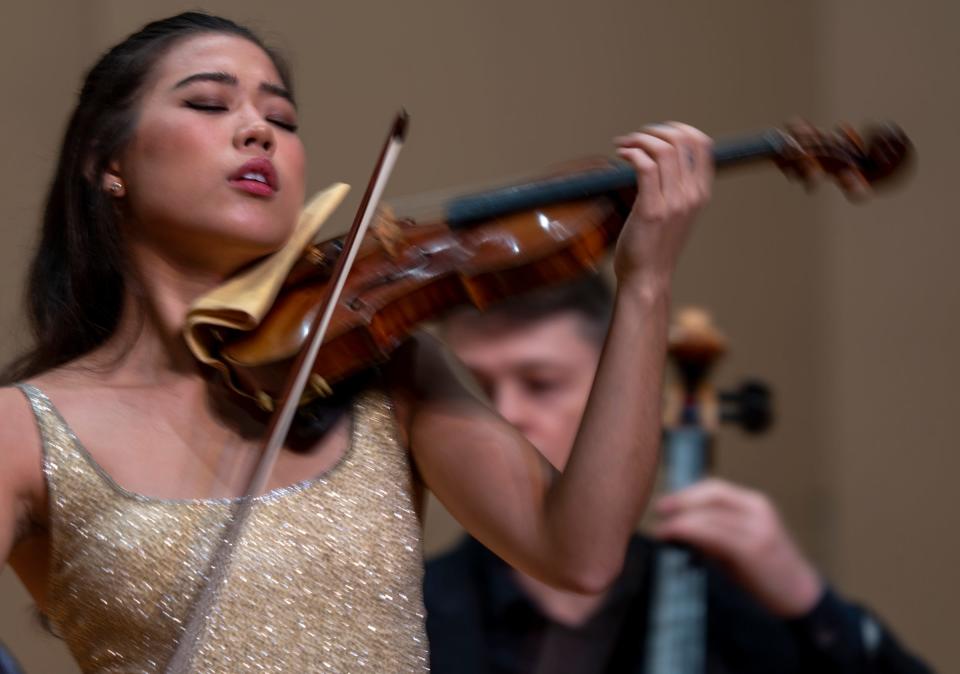 Claire Wells performs Thursday, Sept. 22, 2022, at Butler University for the classical finals for the International Violin Competition of Indianapolis. The competition takes place every four years, and is open to young violinists. The East Coast Chamber Orchestra accompanied the musicians during selected Mozart and Kreisler pieces.