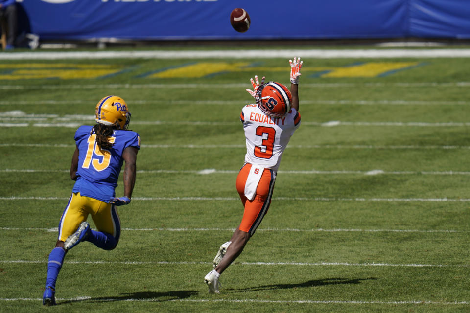 Syracuse wide receiver Taj Harris (3) makes a touchdown catch ahead of Pittsburgh defensive back Jason Pinnock (15) during the first half of an NCAA college football game, Saturday, Sept. 19, 2020, in Pittsburgh. (AP Photo/Keith Srakocic)