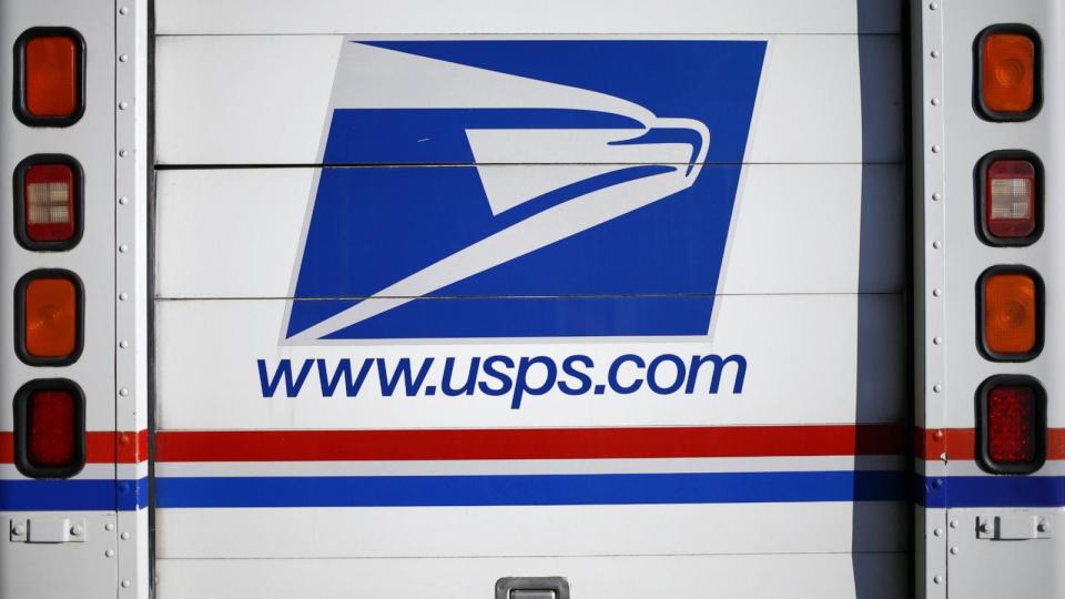 PHOTO: A USPS mail delivery vehicle is seen outside a post office, July 3, 2022, in Louisville, Ky. (Luke Sharrett/Bloomberg via Getty Images)