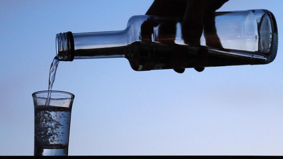 Man pouring a drink