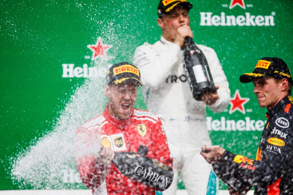 Well, glad that’s over: Vettel, Bottas and Verstappen celebrate the end of a dull Canadian Grand Prix