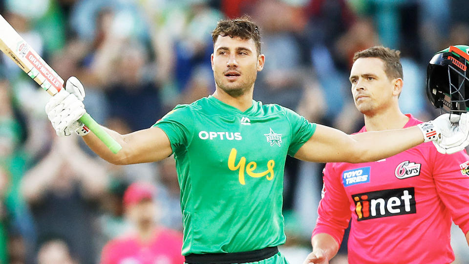 Marcus Stoinis raises his bat after making one hundred during the Big Bash League match between the Melbourne Stars and the Sydney Sixers at the MCG on January 12, 2020 in Melbourne, Australia. (Photo by Daniel Pockett - CA/Cricket Australia via Getty Images )