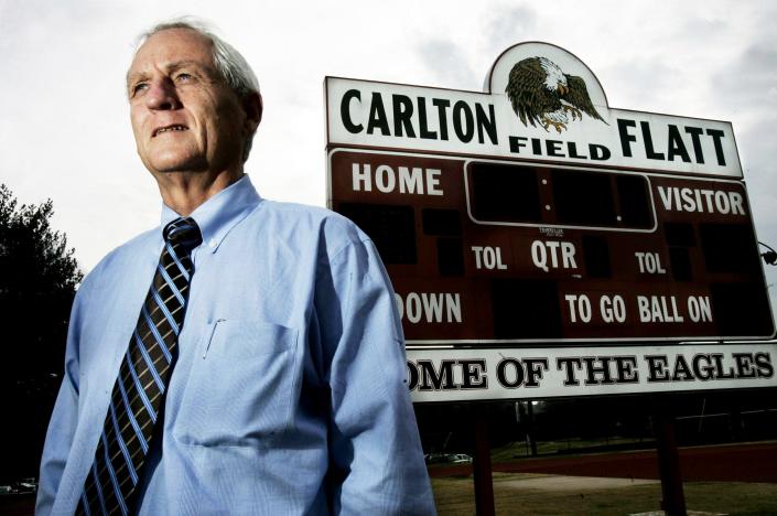 Brentwood Academy head coach Carlton Flatt, who has the most wins as a Tennessee high school coach, poses Nov. 29, 2006 at the school's football field that is named after him.