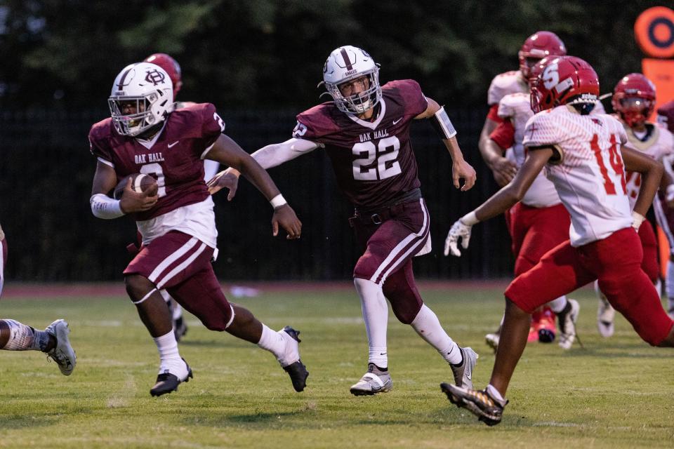 Oak Hall running back Abram Jerkins (2) runs the ball in for a touchdown against Bishop Snyder High School in Gainesville, FL on Friday, September 2, 2022.