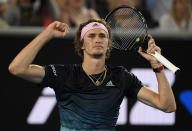 Germany's Alexander Zverev celebrates after defeating France's Jeremy Chardy in their second round match at the Australian Open tennis championships in Melbourne, Australia, Friday, Jan. 18, 2019. (AP Photo/Andy Brownbill)