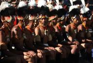 Naga tribesmen from the Yimchunger tribe wait to perform.