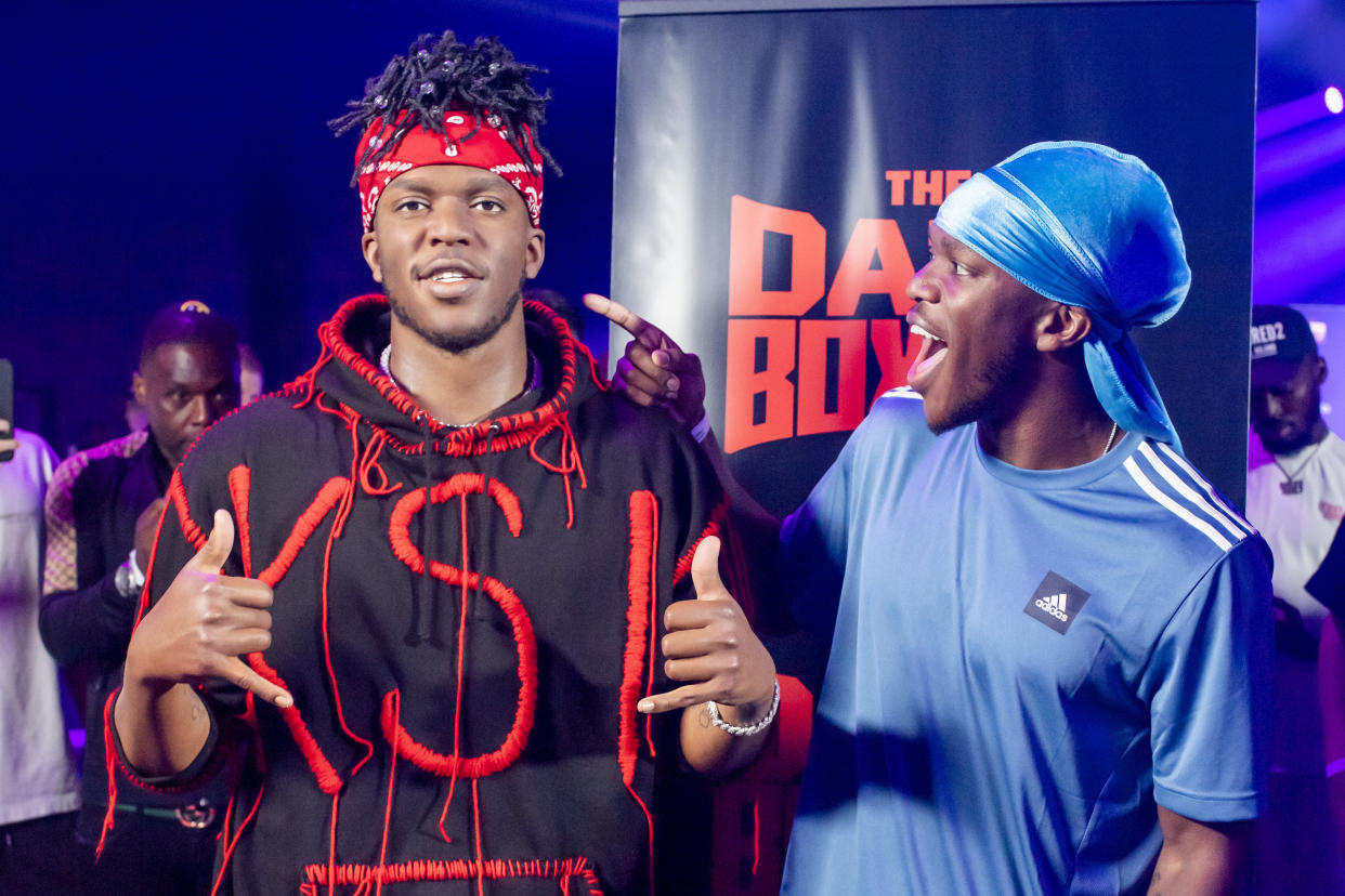 LONDON, ENGLAND - AUGUST 26: KSI poses beside his waxwork figure by Madame Tussauds at The O2 during KSI's weigh-in ahead of his boxing match against Swarmz and Pineda on August 26, 2022 in London, England. (Photo by Anthony Devlin/Getty Images)