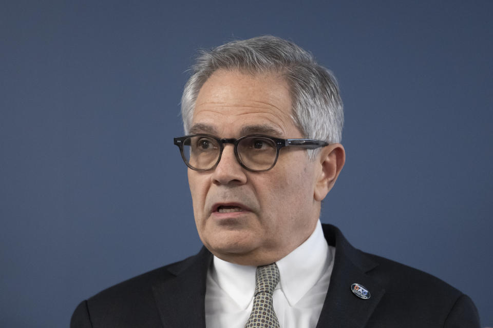 Philadelphia District Attorney Larry Krasner speaks during a news conference in Philadelphia, Tuesday, Dec. 19, 2023. Authorities say a man accused of slashing people with a large knife while riding a bicycle on a rail trail in Philadelphia is now a person of interest in the cold-case murder of a medical student that occurred among a series of high-profile sexual assaults two decades ago. (AP Photo/Matt Rourke)