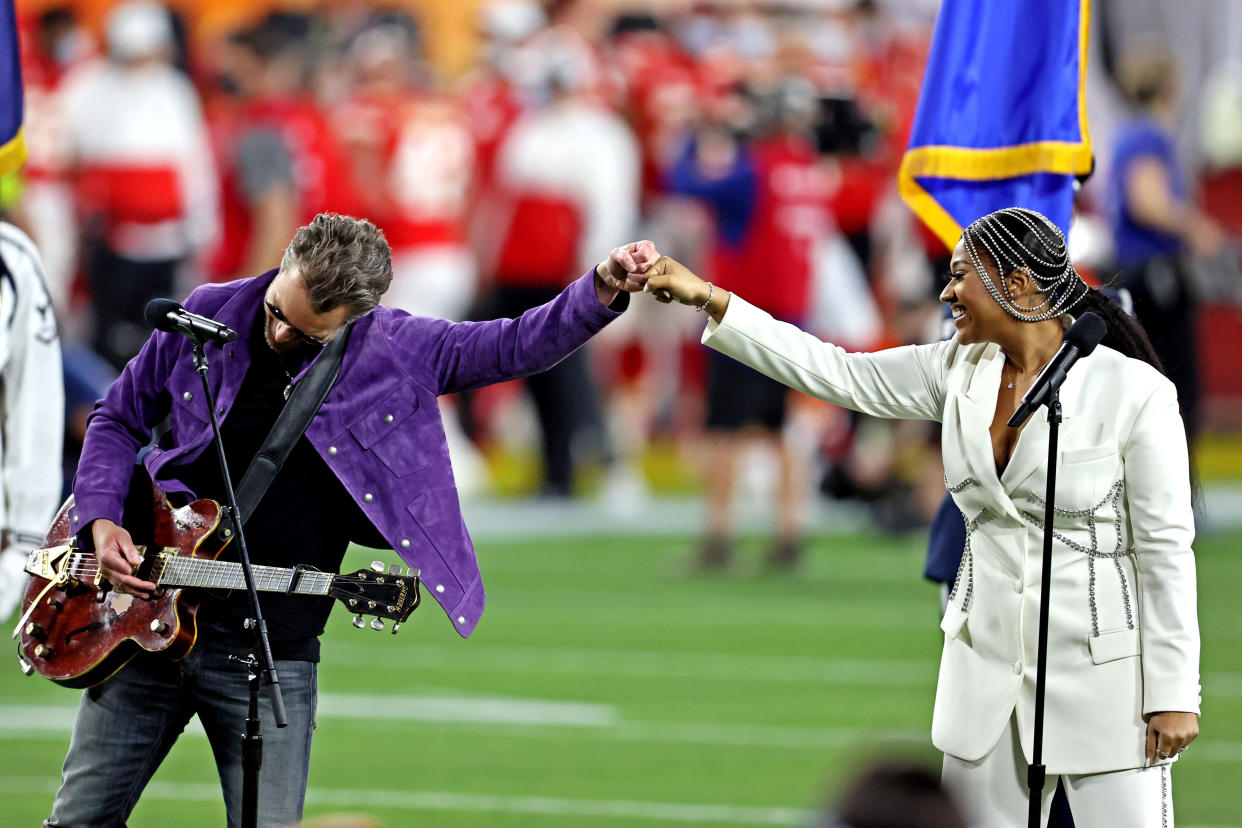 azmine Sullivan and Eric Church perform the national anthem before Super Bowl LV between the Kansas City Chiefs and the Tampa Bay Buccaneers at Raymond James Stadium. (Photo:Matthew Emmons-USA TODAY Sports)