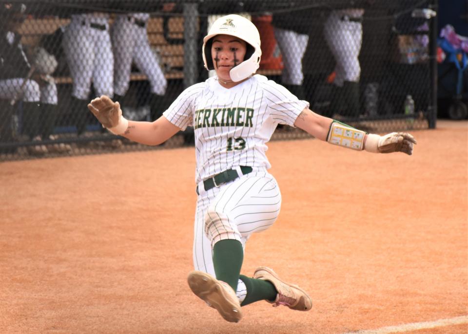 Herkimer College General Alexys Rosick slides home safely during Game 2 of the best-of-three Region III-A championship series against Jefferson Community College Thursday at Hamilton College.