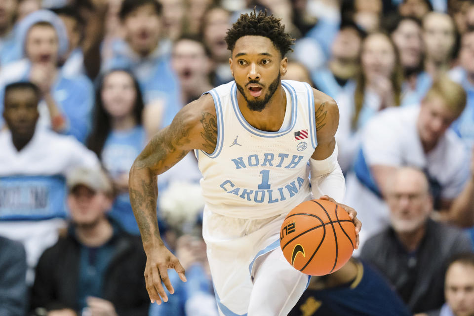 North Carolina forward Leaky Black (1) brings the ball up court in the first half of an NCAA college basketball game against Notre Dame on Saturday, Jan. 7, 2023, in Chapel Hill, N.C. (AP Photo/Jacob Kupferman)