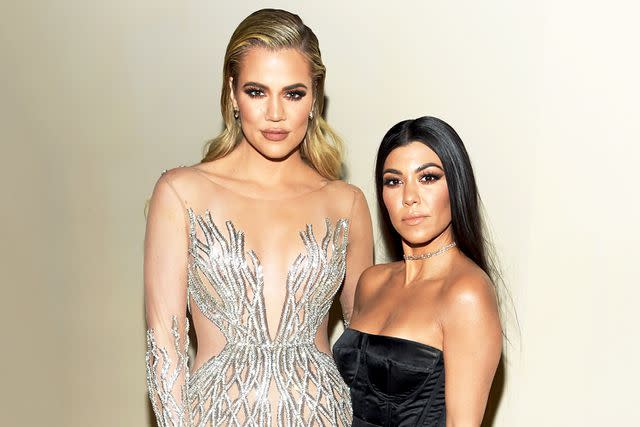 <p>Clint Spaulding/Getty</p> Khloé Kardashian and Kourtney Kardashian attend 2016 Gabrielle's Angel Foundation For Cancer Research Angel Ball in New York