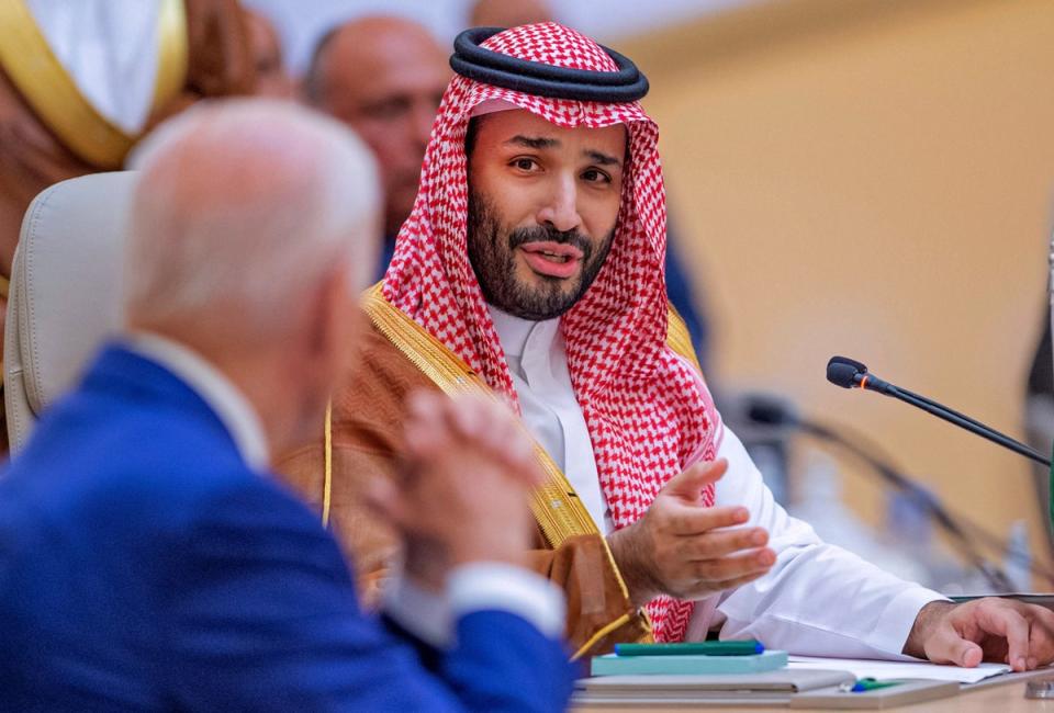 Saudi Crown Prince Mohammed bin Salman speaking to US President Joe Biden during the Jeddah Security and Development Summit on Saturday (Saudi Royal Palace/AFP via Getty)