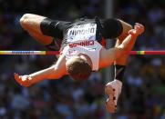 Derek Drouin of Canada competes in the men's high jump qualifying round during the 15th IAAF World Championships at the National Stadium in Beijing, China, August 28, 2015. REUTERS/Kai Pfaffenbach