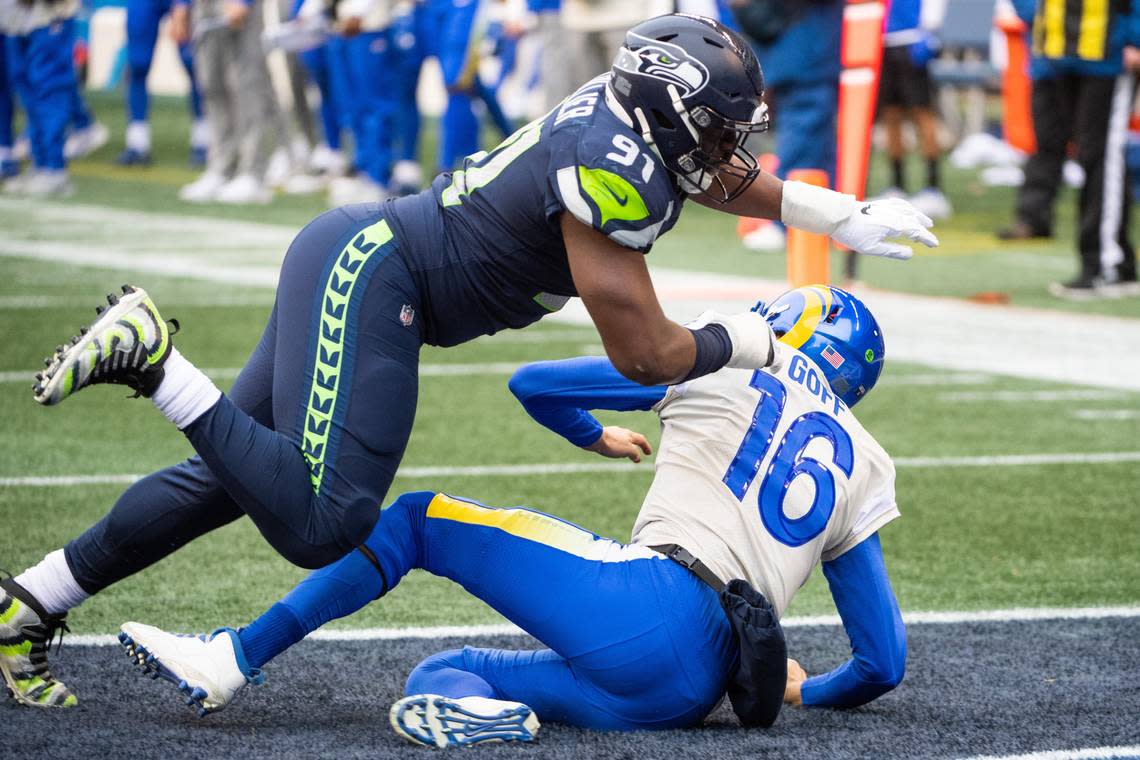 Seattle Seahawks defensive end L.J. Collier hits Los Angeles Rams quarterback Jared Goff. The Seattle Seahawks played the Los Angeles Rams in a NFL wildcard playoff game at Lumen Field in Seattle, Wash., on Saturday, Jan. 9, 2021.