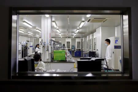 Researchers work at a laboratory of WuXi AppTec (Shanghai) Co. Ltd. in Shanghai, China, April 25, 2016. REUTERS/Aly Song