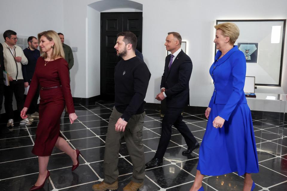 Ukrainian President Volodymyr Zelenskiy, Ukraine's first lady Olena Zelenska, Polish first lady Agata Kornhauser-Duda and Poland's President Andrzej Duda walk at the Presidential Palace in Warsaw (REUTERS)