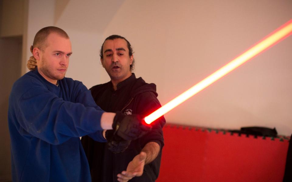 Tom, left, learned from martial arts expert Faisal Mian - Jeff Gilbert