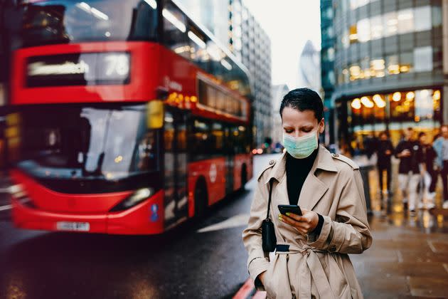 People around the world wearing face masks to protect themselves and others during Coronavirus pandemic (Photo: Drazen_ via Getty Images)