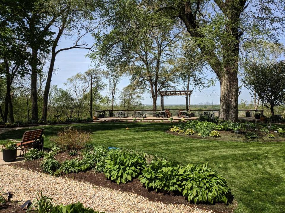 View of the garden and patio at Hostas on the Bluff with the St. Louis skyline just visible in the background Jennifer Green/jgreen@bnd.com