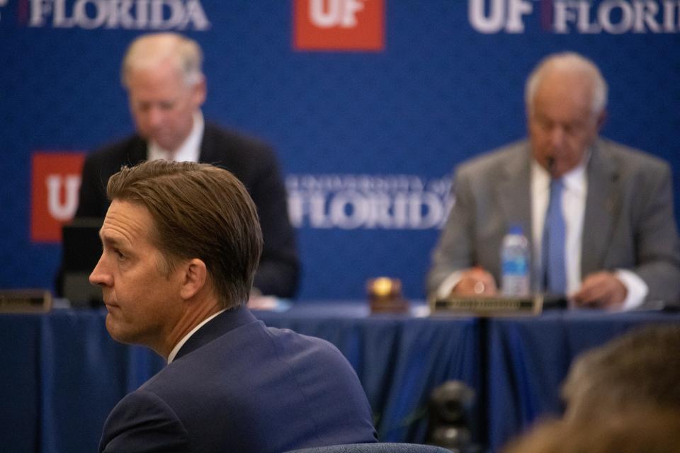U.S. Sen. Ben Sasse listens to student and faculty concerns during the University of Florida board of trustees hearing Tuesday at Emerson Hall in Gainesville. The board voted to approve his hiring as UF president.
