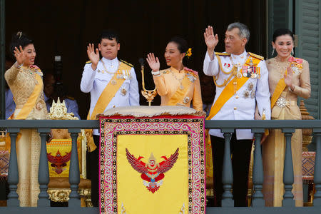 Thailand's newly crowned King Maha Vajiralongkorn, Queen Suthida, Princess Bajrakitiyabha, Prince Dipangkorn and Princesses Sirivannavari Nariratana are seen at the balcony of Suddhaisavarya Prasad Hall at the Grand Palace where King grants a public audience to receive the good wishes of the people in Bangkok, Thailand May 6, 2019.REUTERS/Jorge Silva