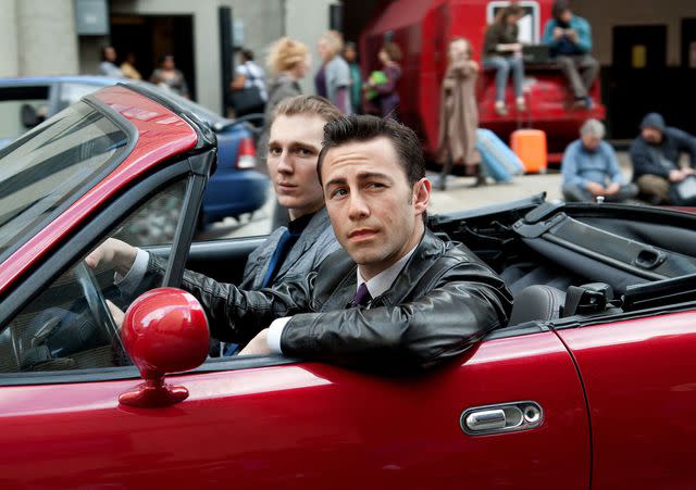 Snap Stills/REX Shutterstock Joseph Gordon-Levitt (front) and Paul Dano in <i>Looper</i>, 2012