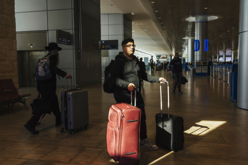 Yoel Levy, a Lev Tahor survivor, prepares to board a flight to the U.S.