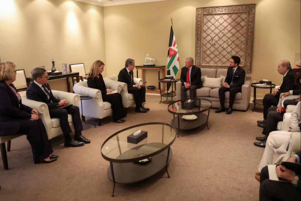 Jordan’s King Abdullah II, centre, and Crown Prince Hussein, centre right, meet with US Secretary of State Antony Blinken, centre left (Royal Hashemite Court via Reuters)