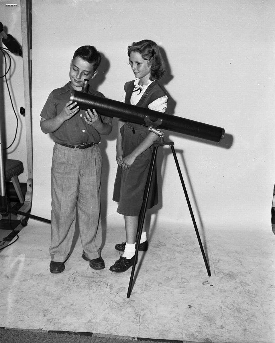 Sept 27, 1950: Don Sutton shows Kay Gross his telescope, a part of the equipment which he used as a member of the Fort Worth junior Astronomers Club. They were among those who hear Albert V. Shatel at the Fort Worth Children’s Museum.