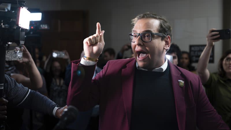 Rep. George Santos, R-N.Y., talks to reporters as he arrives to the Republican caucus meeting at the Capitol in Washington on Oct. 13, 2023. Santos provided a few memorable moments in 2023.