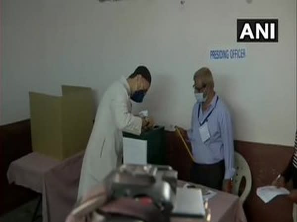 AIMIM President Asaduddin Owaisi casts vote in GHMC polls on Tuesday.  [Photo/ANI]