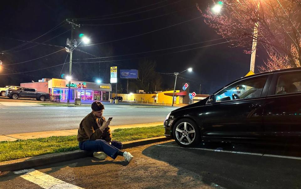 James Holtzclaw, a Charlotte resident, returned to the accident location on South Boulevard where he waited on hold with 911 for several minutes.