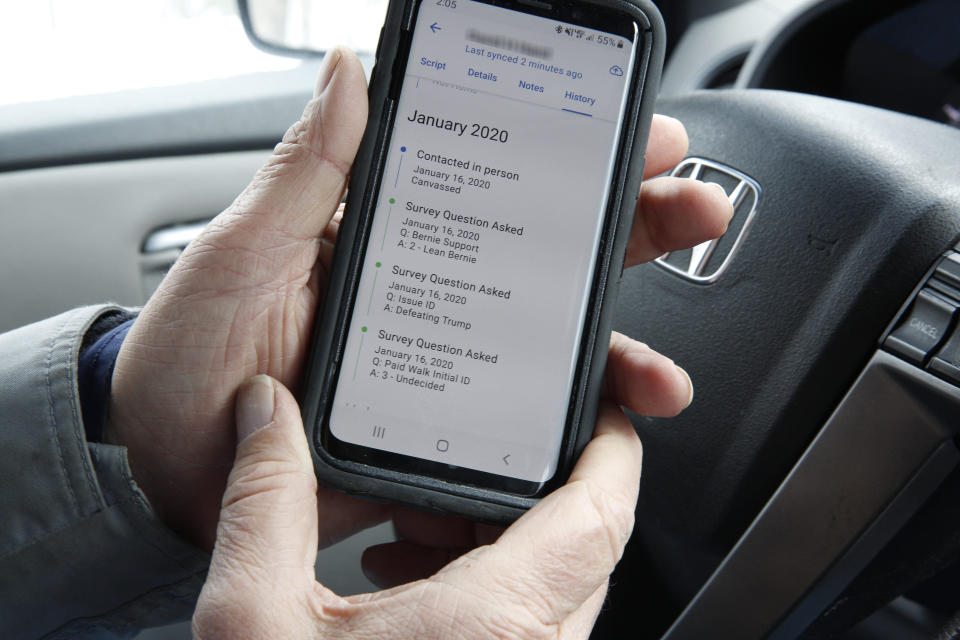 Bernie Sanders volunteer canvassers use the app miniVAN to map and record voter contacts as they do their route. Name was redacted for privacy. (Michael Forster Rothbart/ZUMA Wire)