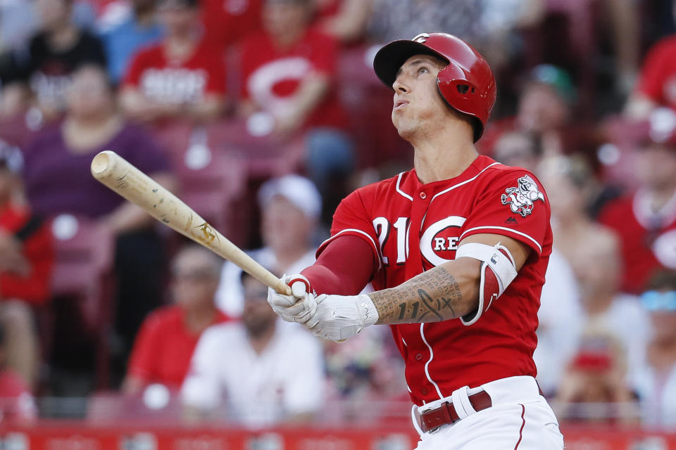 Cincinnati Reds' pitcher Michael Lorenzen follows through on his pinch-hit grand slam against the Milwaukee Brewers. (AP)