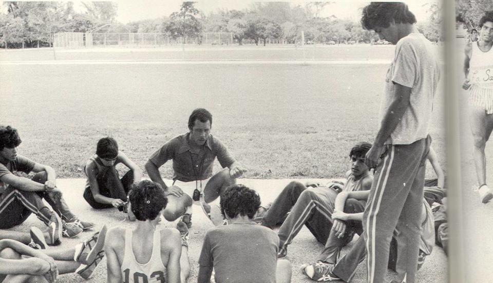 Belen Jesuit athletic director Carlos Barquin (middle), seen here coaching the Wolverines’ cross-country runners during the 1970s, is a Miami Herald’s Lifetime Achievement Award recipient.