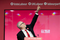 Jeremy Corbyn, Leader of Britain's opposition Labour Party speaks on stage at the launch of Labour's General Election manifesto, at Birmingham City University, England, Thursday, Nov. 21, 2019. Britain goes to the polls on Dec. 12. (AP Photo/Kirsty Wigglesworth)