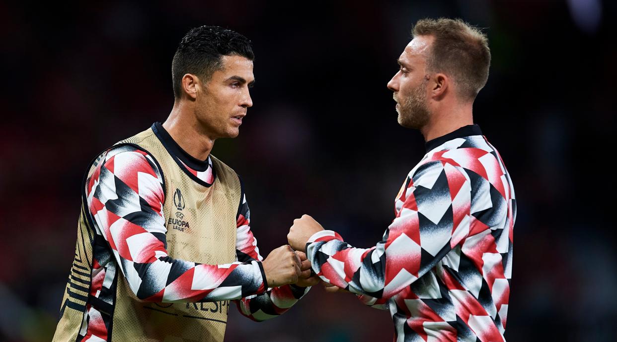  Cristiano Ronaldo and Christian Eriksen of Manchester United bump fists during the warm-up prior to the UEFA Europa League match between Manchester United and Real Sociedad at Old Trafford on September 8, 2022 in Manchester, England. 