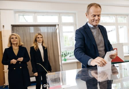 European Council President Donald Tusk casts his vote during parliamentary election in Sopot