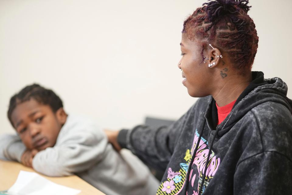 Cyan Pride, 23, and her 7-year-old son, Cy’Meir Pride, talk about their journey to receive a Section 8 housing voucher while staying at the YWCA Family Center on the Near East Side. Pride is excited to be able to move out of the YWCA, where she has lived for three months, and into her own place near where she works and her son goes to school.