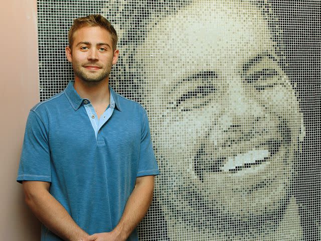 <p>Tony Gough/Newspix/Getty</p> Cody Walker unveils a giant mosaic plaque dedicated to Paul Walker at United Cinemas in Craigieburn, New South Wales