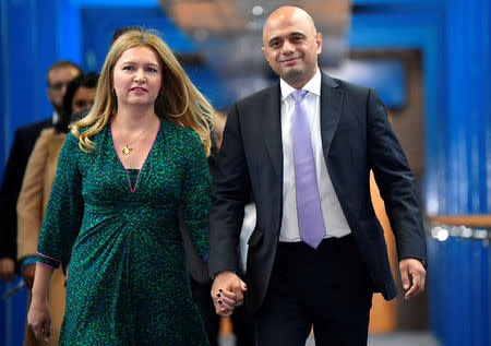 Britain's Secretary of State for the Home Department Sajid Javid and his wife Laura walk to the conference hall on the third day of the Conservative Party Conference in Birmingham, Britain, October 2, 2018. REUTERS/Toby Melville