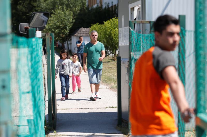 Migrants at a migrant reception centre in Vamosszabadi