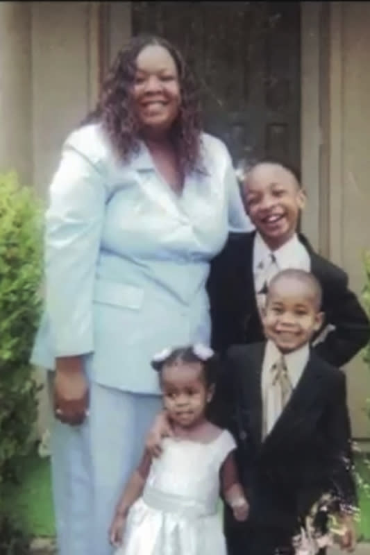 In this undated photo provided by Ray Montgomery, Lovetta Armstead and her three children, Jazzmen, Jarrett and Jerome, celebrate Easter at the home of Armstead’s parents. Texas inmate Gary Green is facing execution Tuesday, March 7, 2023, for fatally stabbing Armstead, his estranged wife, and drowning 6-year-old Jazzmen in 2009. (Ray Montgomery via AP)